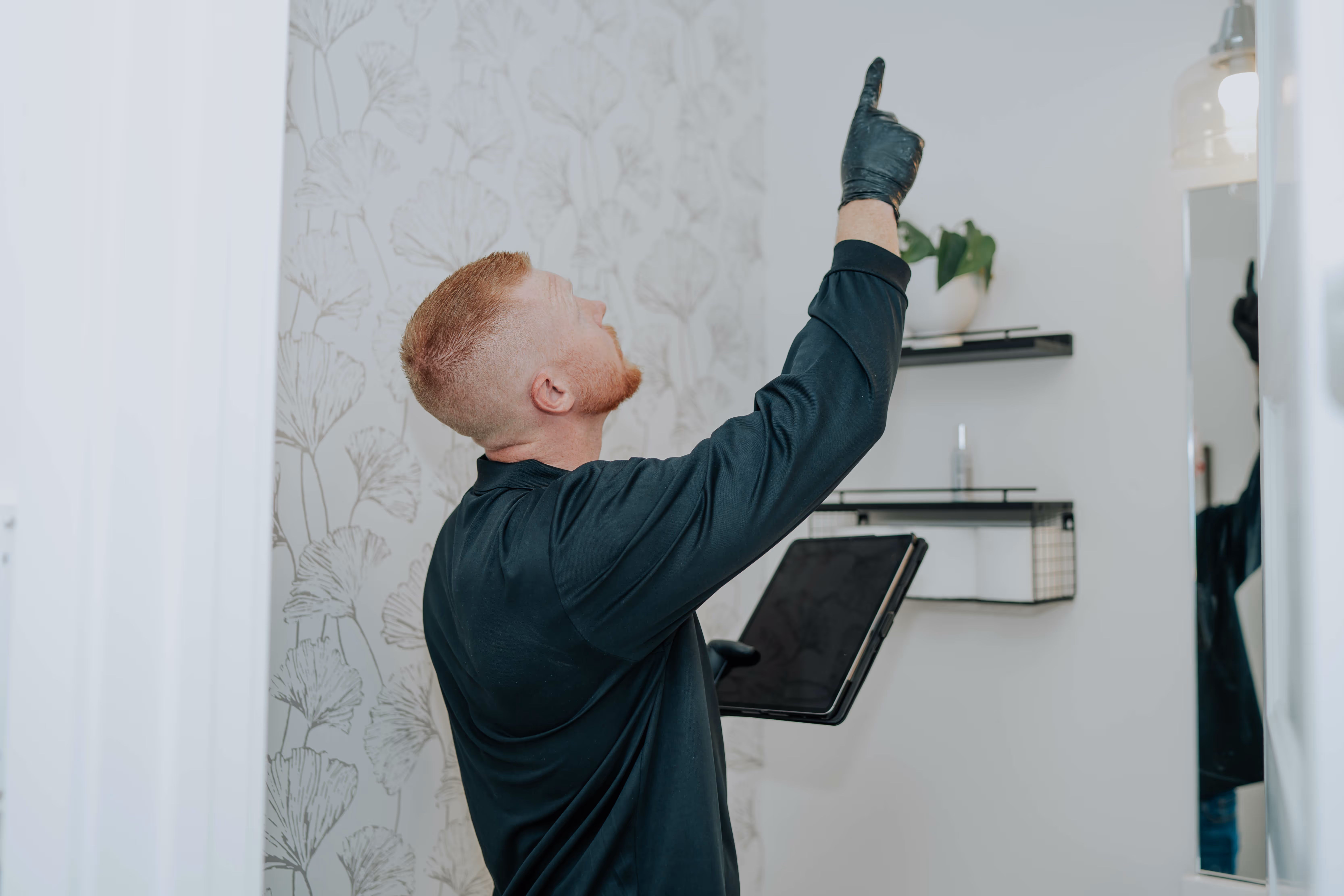 Pure Air Restored technician conducting a full property mold inspection